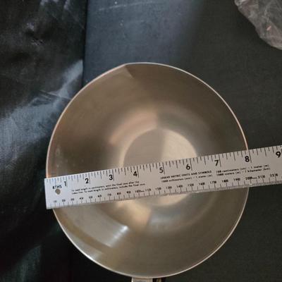 KitchenAid handmixer with new KitchenAid measuring cups, stainless spoons, and a nice stainless bowl