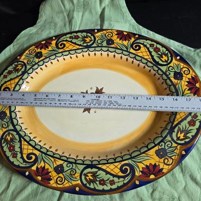 Beautiful Corsica platter with two matching smaller square platters and a green colored apron