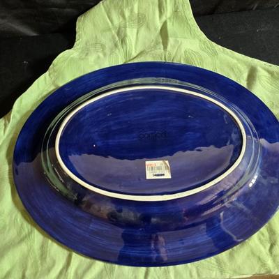 Beautiful Corsica platter with two matching smaller square platters and a green colored apron