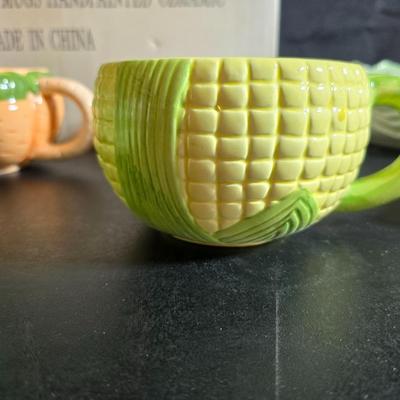 Fun dinnerware - Vegetable mugs and flower bowls with leaf plates