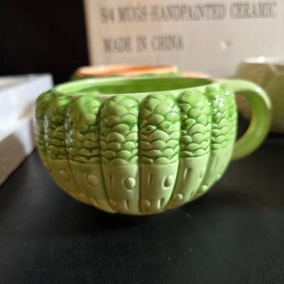 Fun dinnerware - Vegetable mugs and flower bowls with leaf plates