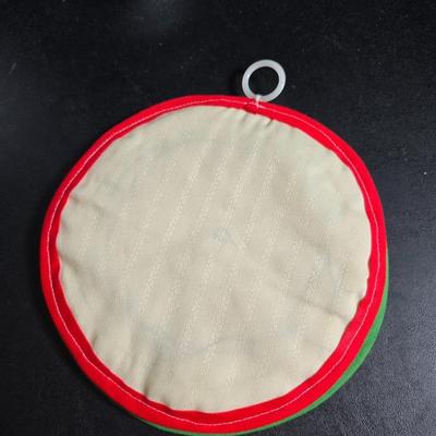 Small Rival crockpot with glass lidded leftover containers, quilted hot pads, spoon rest and more