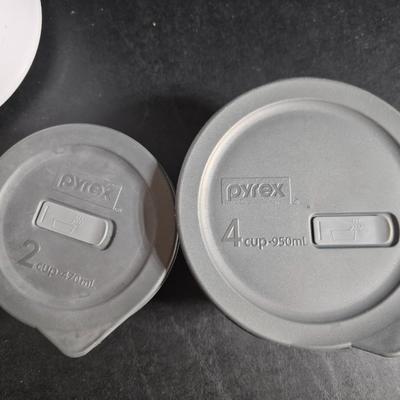 Small Rival crockpot with glass lidded leftover containers, quilted hot pads, spoon rest and more
