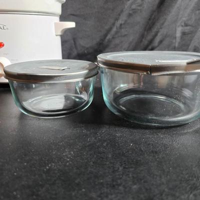 Small Rival crockpot with glass lidded leftover containers, quilted hot pads, spoon rest and more