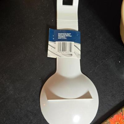 Small Rival crockpot with glass lidded leftover containers, quilted hot pads, spoon rest and more