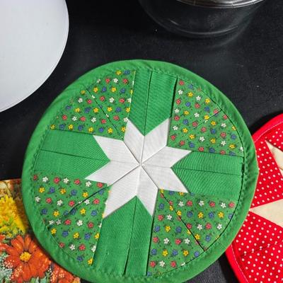 Small Rival crockpot with glass lidded leftover containers, quilted hot pads, spoon rest and more