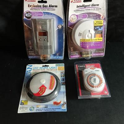 Kidde Explosive gas alarm - Intelligent alarm combination - LED Work light and a Timex timer all brand new!