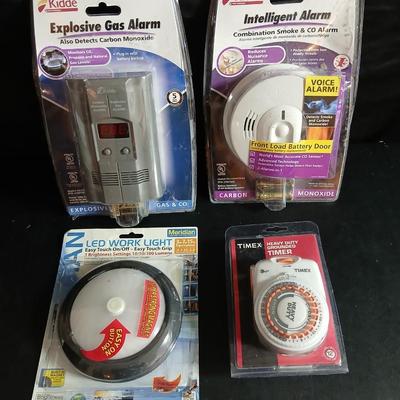 Kidde Explosive gas alarm - Intelligent alarm combination - LED Work light and a Timex timer all brand new!