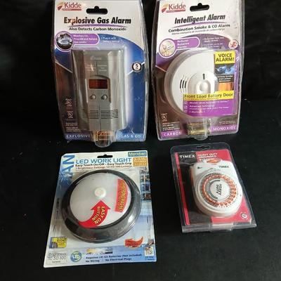 Kidde Explosive gas alarm - Intelligent alarm combination - LED Work light and a Timex timer all brand new!