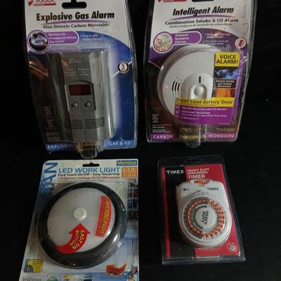 Kidde Explosive gas alarm - Intelligent alarm combination - LED Work light and a Timex timer all brand new!