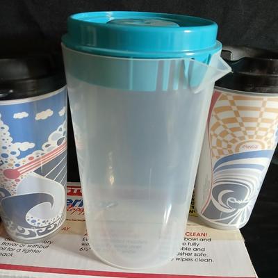 Date night -Movie night! Presto pop Microwave popper, Popcorn bowl, Snuggie blanket, four Movies on DVD, and two large cups with a pitcher