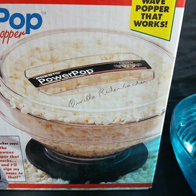 Date night -Movie night! Presto pop Microwave popper, Popcorn bowl, Snuggie blanket, four Movies on DVD, and two large cups with a pitcher