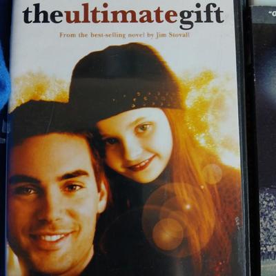 Date night -Movie night! Presto pop Microwave popper, Popcorn bowl, Snuggie blanket, four Movies on DVD, and two large cups with a pitcher