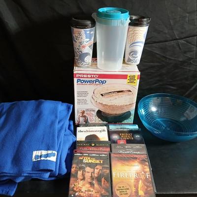 Date night -Movie night! Presto pop Microwave popper, Popcorn bowl, Snuggie blanket, four Movies on DVD, and two large cups with a pitcher
