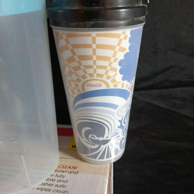 Date night -Movie night! Presto pop Microwave popper, Popcorn bowl, Snuggie blanket, four Movies on DVD, and two large cups with a pitcher