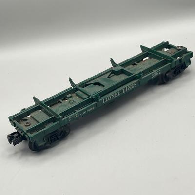 Lot 234: Vintage Lionel Train Cars - Refrigerated Milk Car, Explosives Car Pieces, Caboose and More