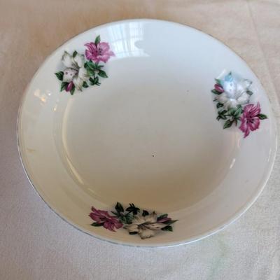 Some beautiful hand painted plates, salt and pepper shakers,