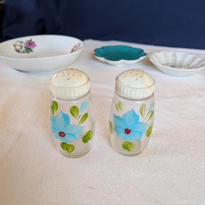 Some beautiful hand painted plates, salt and pepper shakers,