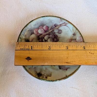 Some beautiful hand painted plates, salt and pepper shakers,