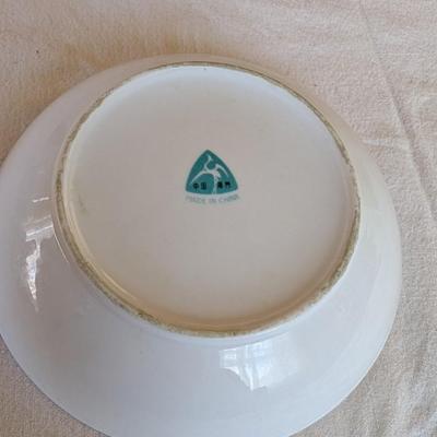 Some beautiful hand painted plates, salt and pepper shakers,