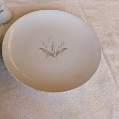 Some beautiful hand painted plates, salt and pepper shakers,