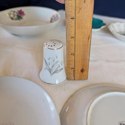 Some beautiful hand painted plates, salt and pepper shakers,