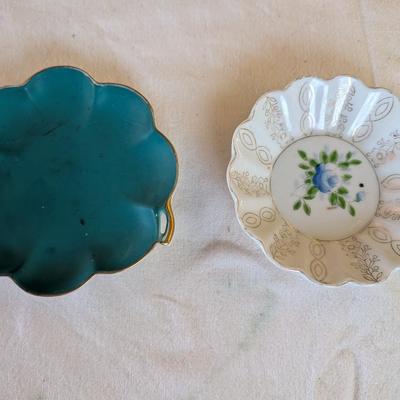 Some beautiful hand painted plates, salt and pepper shakers,