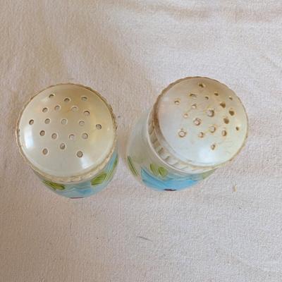 Some beautiful hand painted plates, salt and pepper shakers,