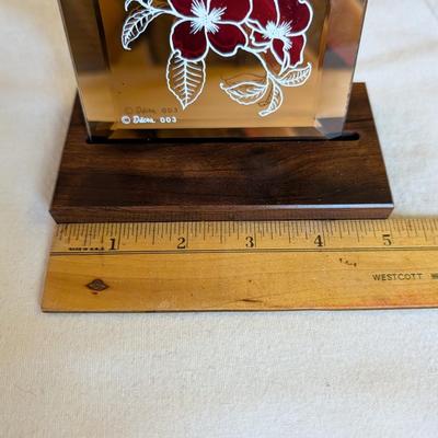 Musical swans, sleeping angel, 40th anniversary plaque, a gold leaf scarf holder.