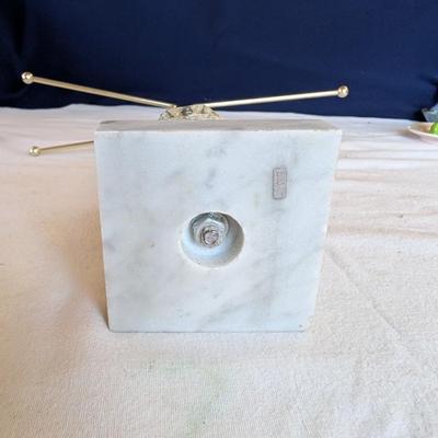 Marble base, glass middle design with gold tone arms. Clear glass diamond point dish with marble base.