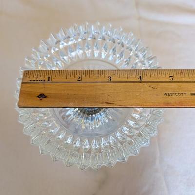 Marble base, glass middle design with gold tone arms. Clear glass diamond point dish with marble base.