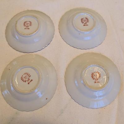 Five small vintage pretty ashtrays.
