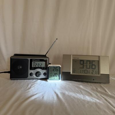 Sharper Image Clock/Thermometer, AM/FM Radio & More (LR-MG)