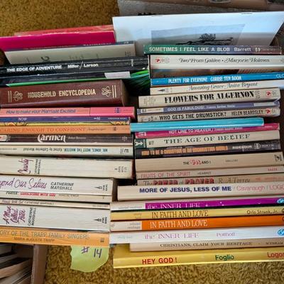 A large flat of miscellaneous books