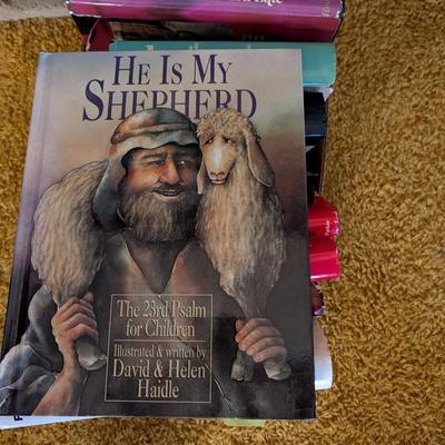 A group of nine books.