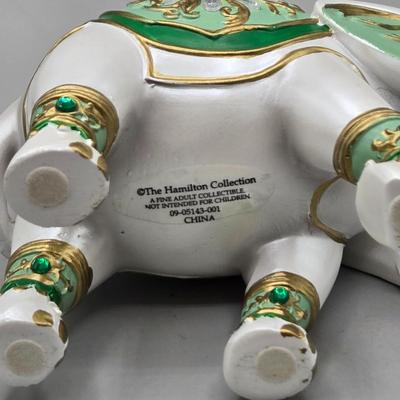 LOT 41: Two White Elephant Ceramic Tea Light Candle Holders, Carved Wooden Elephant, Feng Shui Elephant, and Hamilton Collection Elephant...