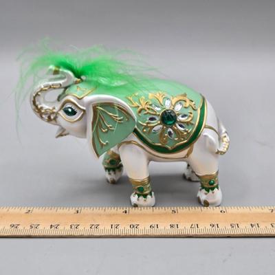 LOT 41: Two White Elephant Ceramic Tea Light Candle Holders, Carved Wooden Elephant, Feng Shui Elephant, and Hamilton Collection Elephant...