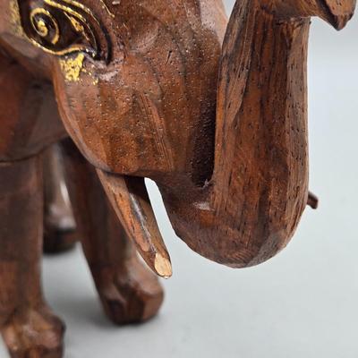 LOT 41: Two White Elephant Ceramic Tea Light Candle Holders, Carved Wooden Elephant, Feng Shui Elephant, and Hamilton Collection Elephant...