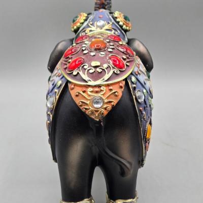 LOT 41: Two White Elephant Ceramic Tea Light Candle Holders, Carved Wooden Elephant, Feng Shui Elephant, and Hamilton Collection Elephant...