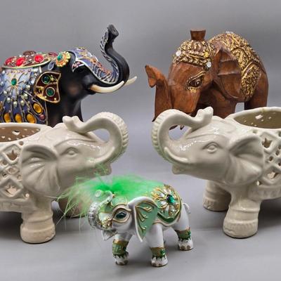 LOT 41: Two White Elephant Ceramic Tea Light Candle Holders, Carved Wooden Elephant, Feng Shui Elephant, and Hamilton Collection Elephant...