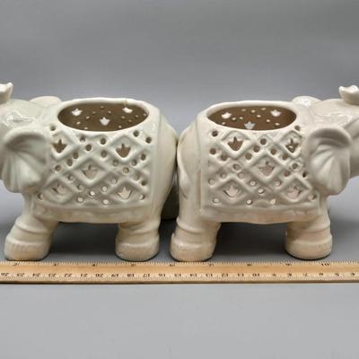 LOT 41: Two White Elephant Ceramic Tea Light Candle Holders, Carved Wooden Elephant, Feng Shui Elephant, and Hamilton Collection Elephant...