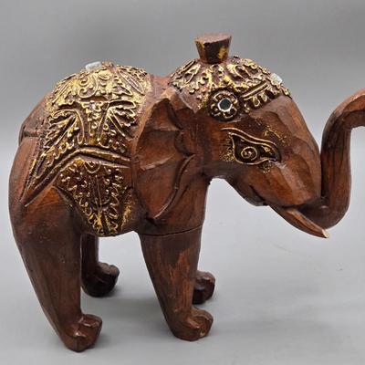 LOT 41: Two White Elephant Ceramic Tea Light Candle Holders, Carved Wooden Elephant, Feng Shui Elephant, and Hamilton Collection Elephant...