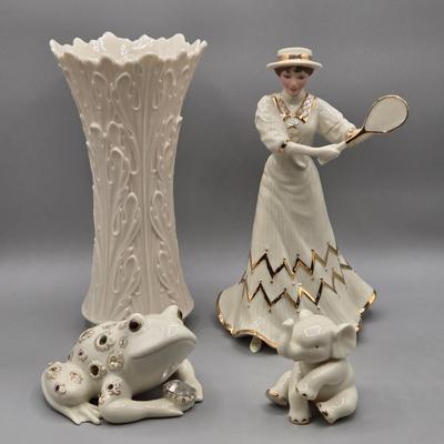 LOT 42: Lenox Victorian Lady of Fashions Tennis At Traymore, Baby Elephant, Prince of Jewels, and Woodland Collection Vase