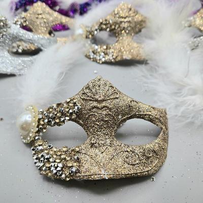 LOT 55: New- Clip-on Fans and Masks Ornaments and More