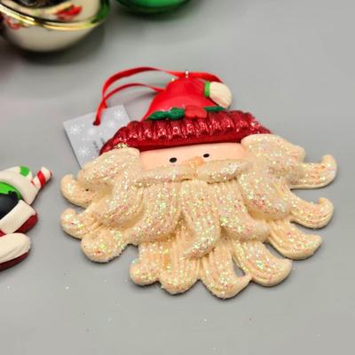 LOT 62: Various New Ornaments Including Elephants, Owls, Bells. Santa, Goebel Berta Hummel AWAY WE GO Children Dog Sled 2003, and More