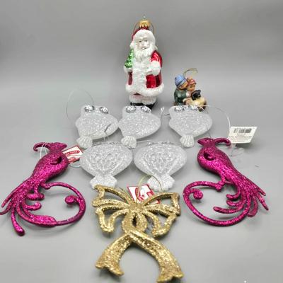 LOT 62: Various New Ornaments Including Elephants, Owls, Bells. Santa, Goebel Berta Hummel AWAY WE GO Children Dog Sled 2003, and More