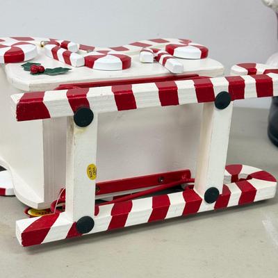 LOT 84: Vintage Ceramic Winking Santa & Small Candy Cane Sleigh