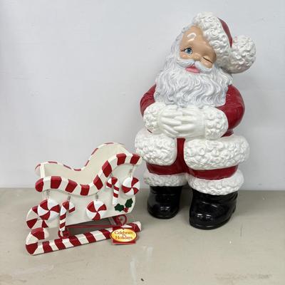 LOT 84: Vintage Ceramic Winking Santa & Small Candy Cane Sleigh