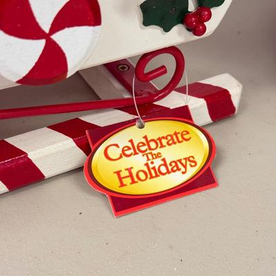 LOT 84: Vintage Ceramic Winking Santa & Small Candy Cane Sleigh