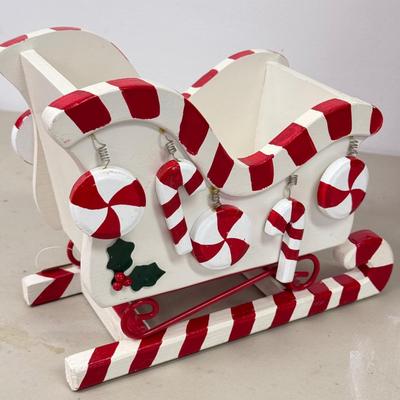 LOT 84: Vintage Ceramic Winking Santa & Small Candy Cane Sleigh